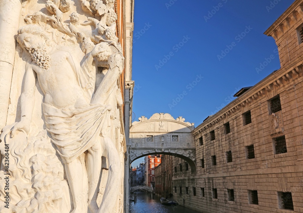 bridge of sighs in Venice in Italy with a statue