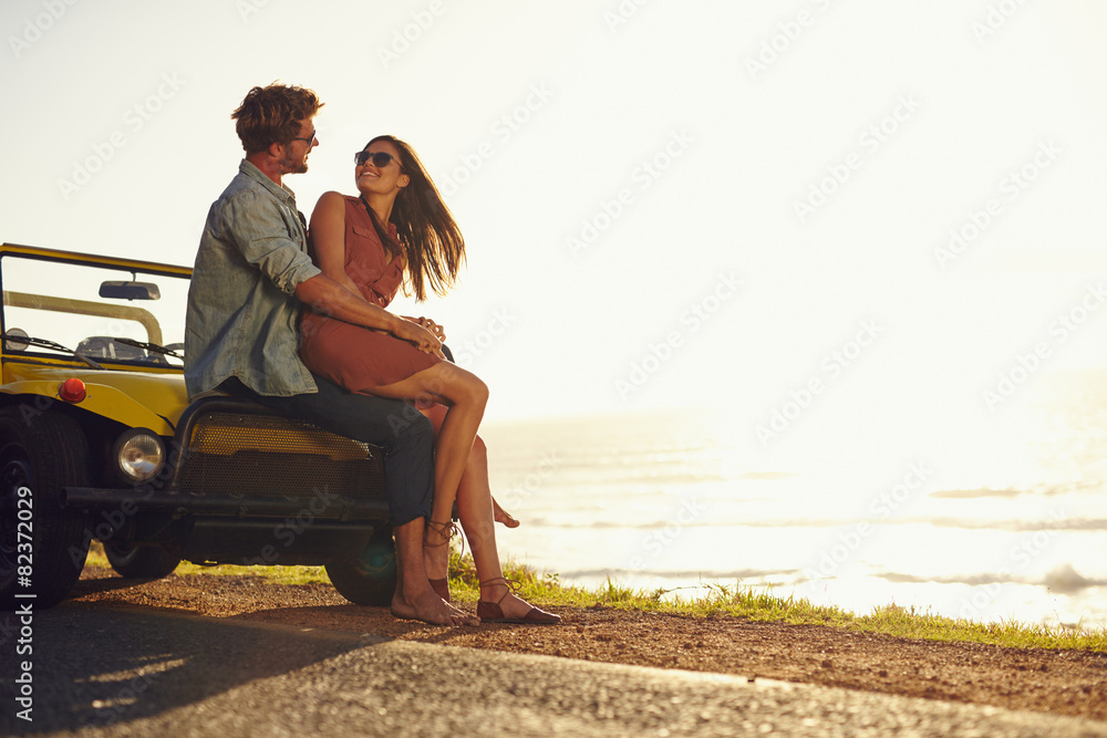 Young couple in love on a road trip Young couple in love on a road trip