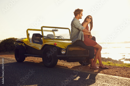 Young couple relaxing together on their road trip