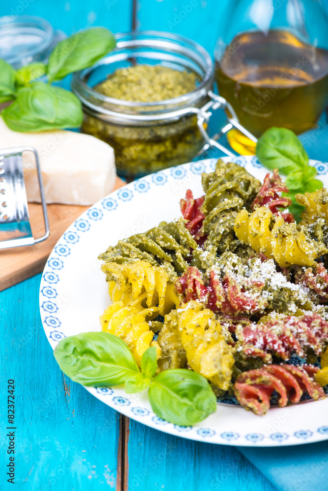 Italian pasta with pesto and fresh basil