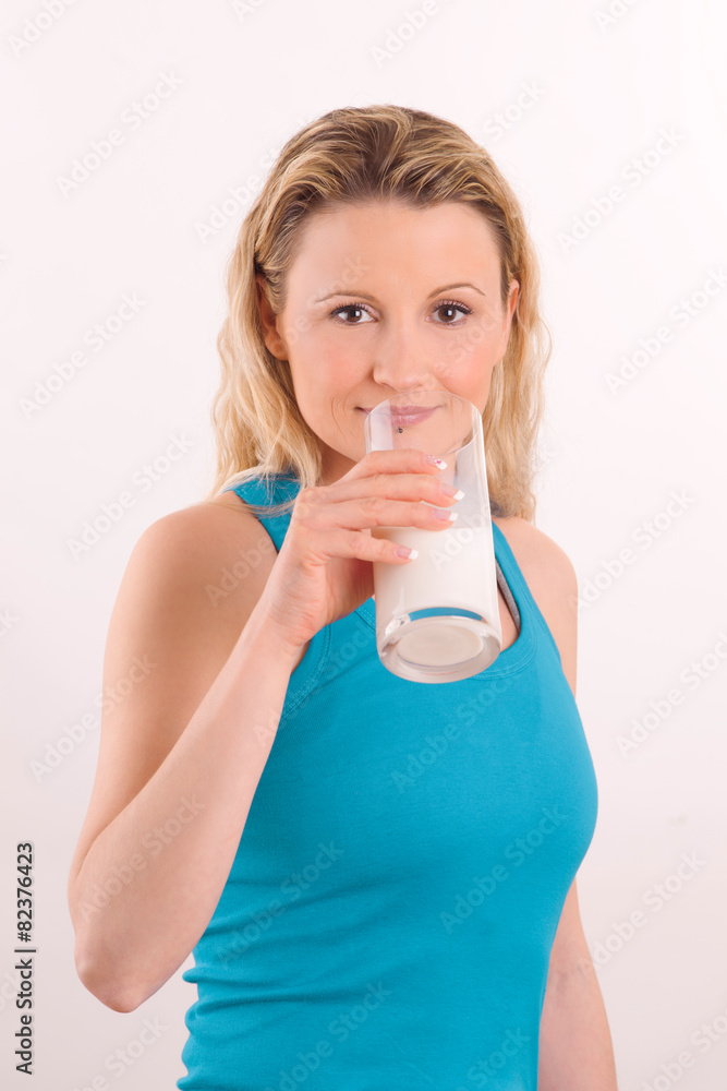young athlete girl with glass of milk young athlete girl with glass of milk