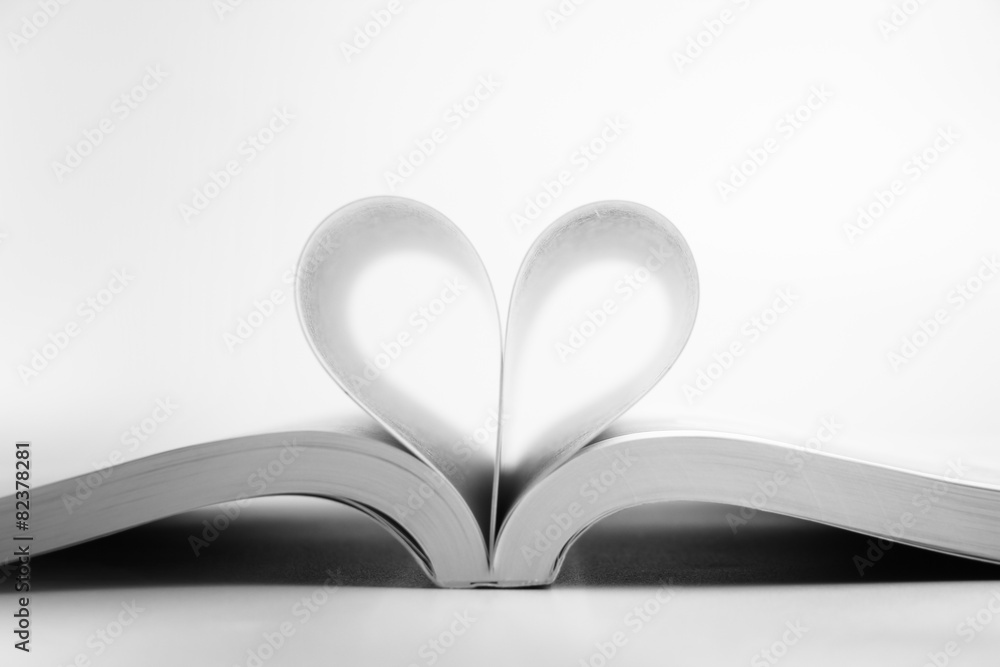 Opened book with heart page Opened book with heart page