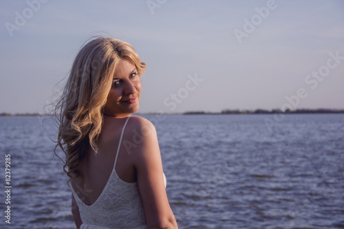 Blond woman in sunset