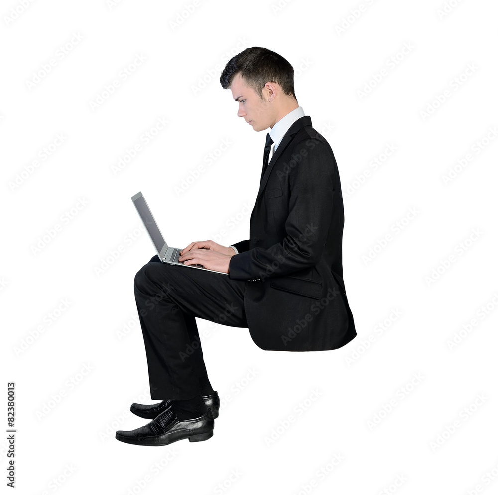 Business man typing laptop