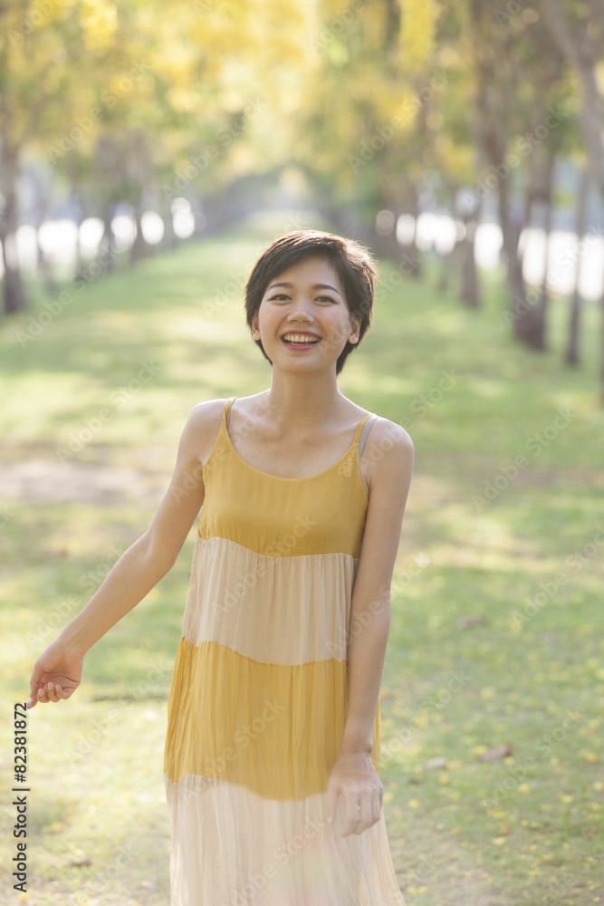 portrait of couples beautiful asian woman standing in blooming f portrait of couples beautiful asian woman standing in blooming f