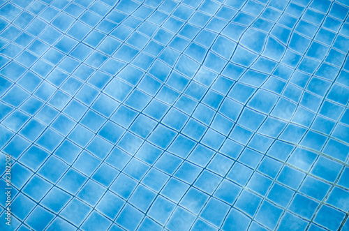 Background of rippled water in swimming pool