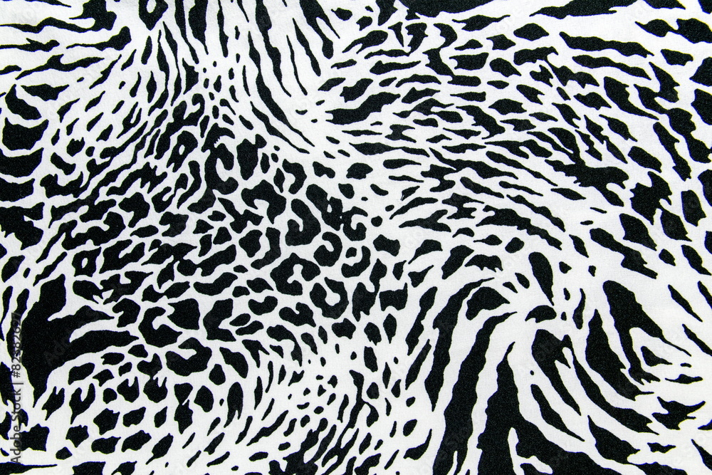 Naklejka premium tekstura tkaniny drukowanej w paski zebra i lamparta na tle