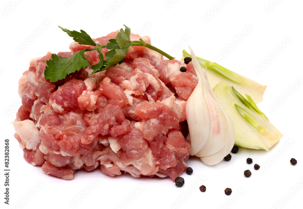 Minced meat, onion, garlic, pepper and herbs isolated white Minced meat, onion, garlic, pepper and herbs isolated white