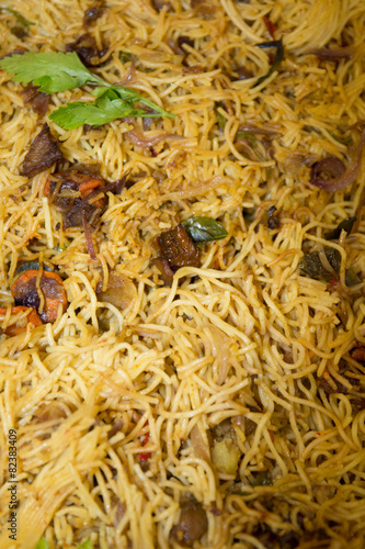 background of tasty noodles Chowmein in plate