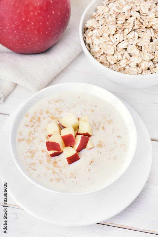 Oat porridge with red apple slices Oat porridge with red apple slices