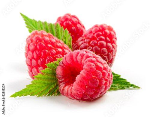 Raspberry with leaves isolated on white