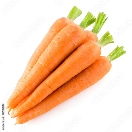 Heap of carrots isolated on white photo