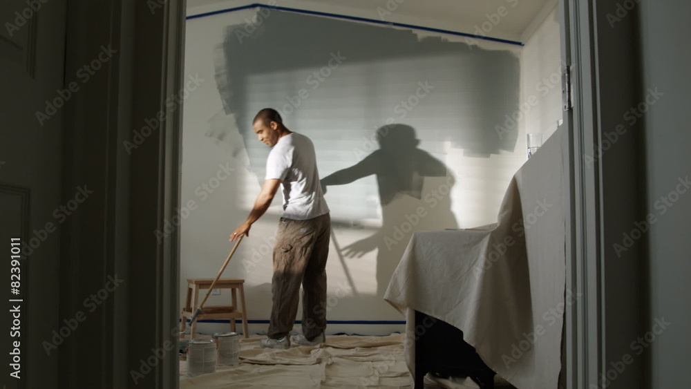 man painting a bedroom man painting a bedroom