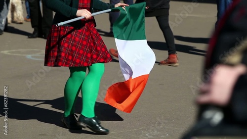 Irish dance for St. Patrick's Day with national Irish flag