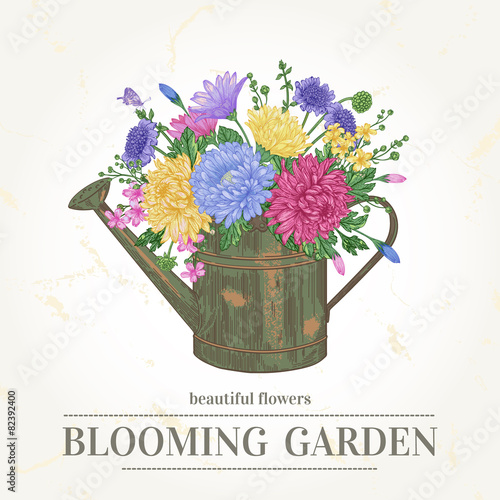 Bouquet of flowers and a copper watering can.