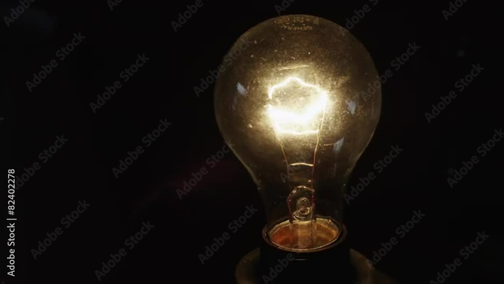 CU Light bulb blinking in dark / Orem, Utah, USA CU Light bulb blinking in dark / Orem, Utah, USA