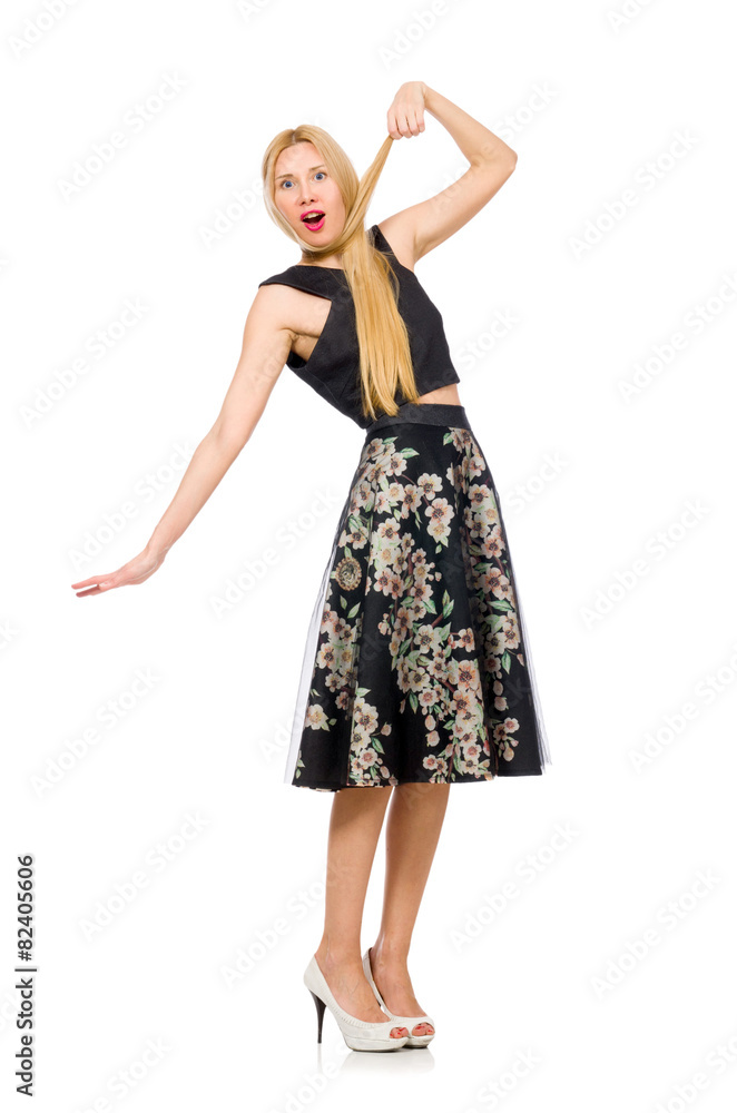 Naklejka premium Woman in floral dark skirt isolated on white