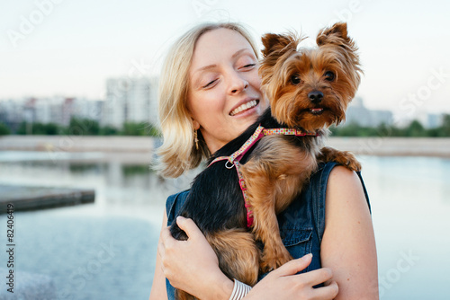 pretty young blonde with small dog