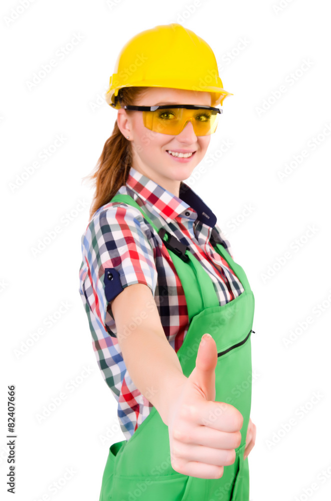 Female handyman in overalls isolated on white Female handyman in overalls isolated on white