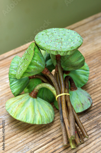 Lotus pods on rattan table