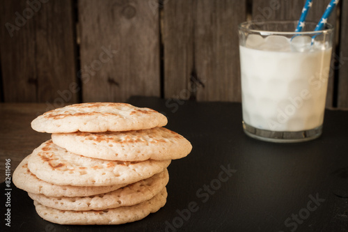 pancakes with milk on a gray background