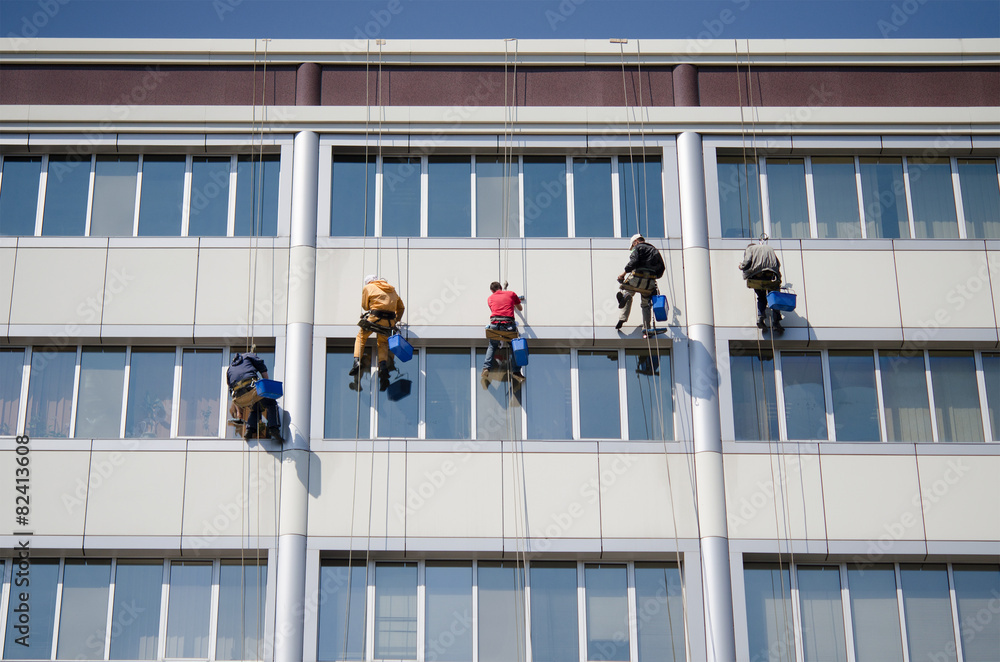 Fototapeta premium window cleaners working