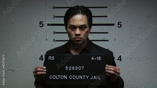 A man being booked for a crime