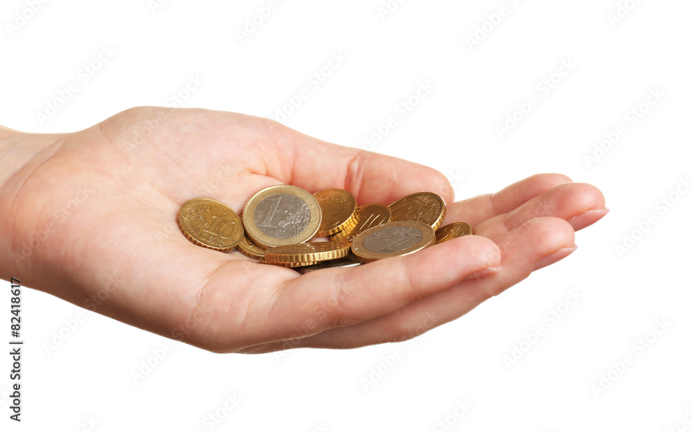 Female hand with coins isolated on white