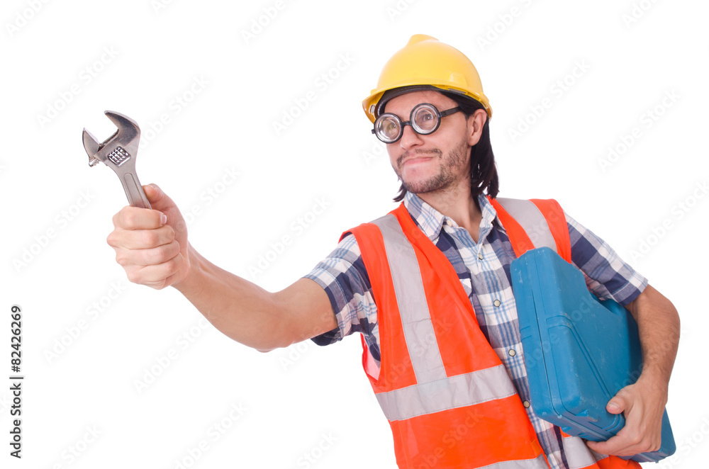 Funny young construction worker with toolbox and wrench isolated Funny young construction worker with toolbox and wrench isolated