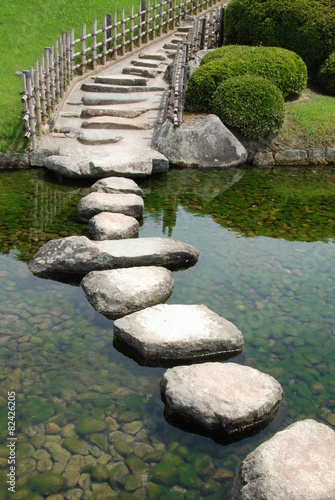 Bridge made of stones in a Japanese garden