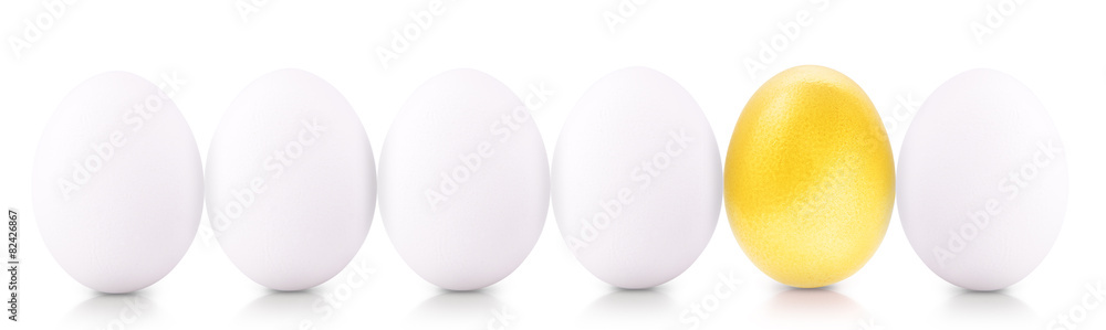 Success Symbol Concept with gold and white eggs Success Symbol Concept with gold and white eggs