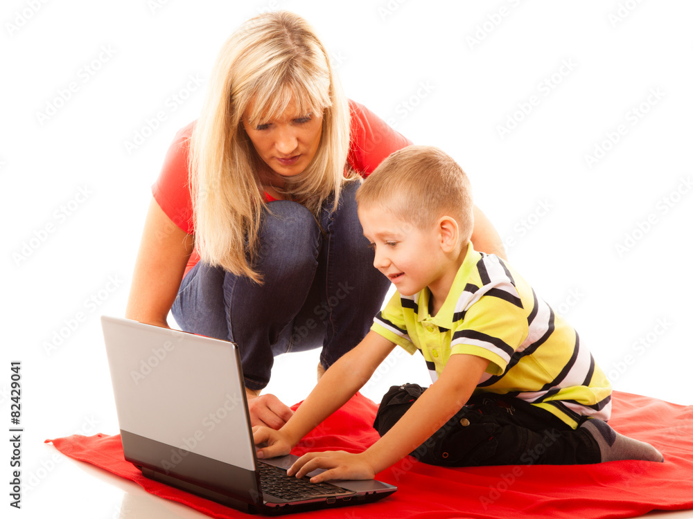 Technology and parenting - boy and mother with laptop Technology and parenting - boy and mother with laptop