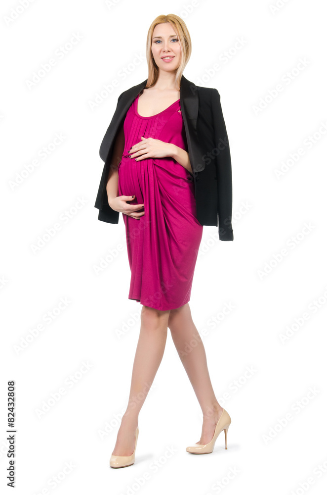 Pretty pregnant woman in pink dress isolated on white Pretty pregnant woman in pink dress isolated on white
