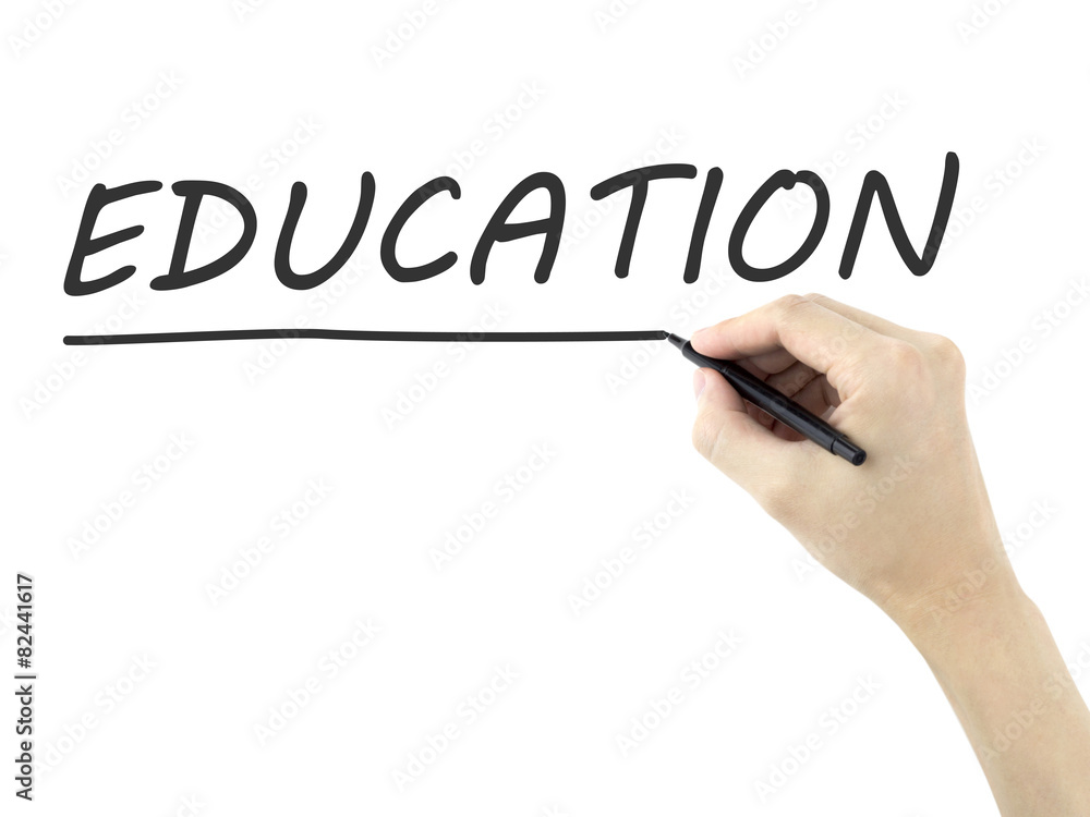 education word written by man's hand education word written by man's hand