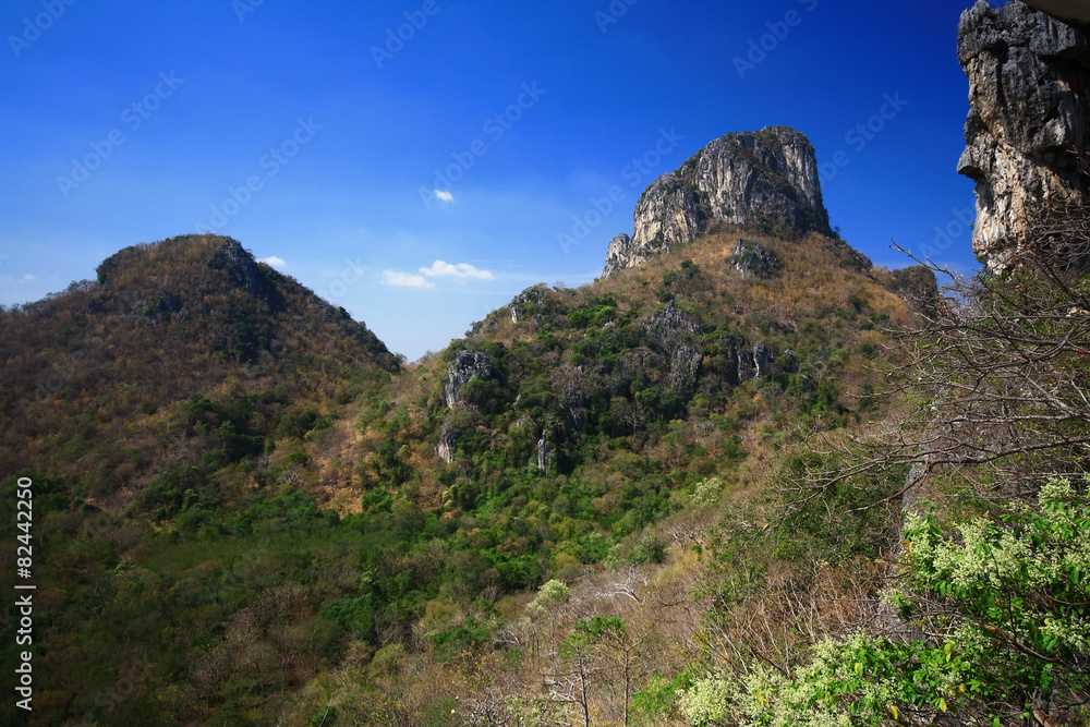 Rock mountain cliff and blue sky Rock mountain cliff and blue sky