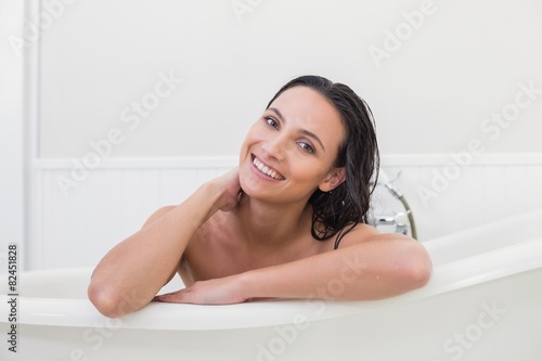 Pretty brunette taking a bath