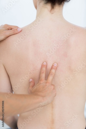 Physiotherapist doing back massage