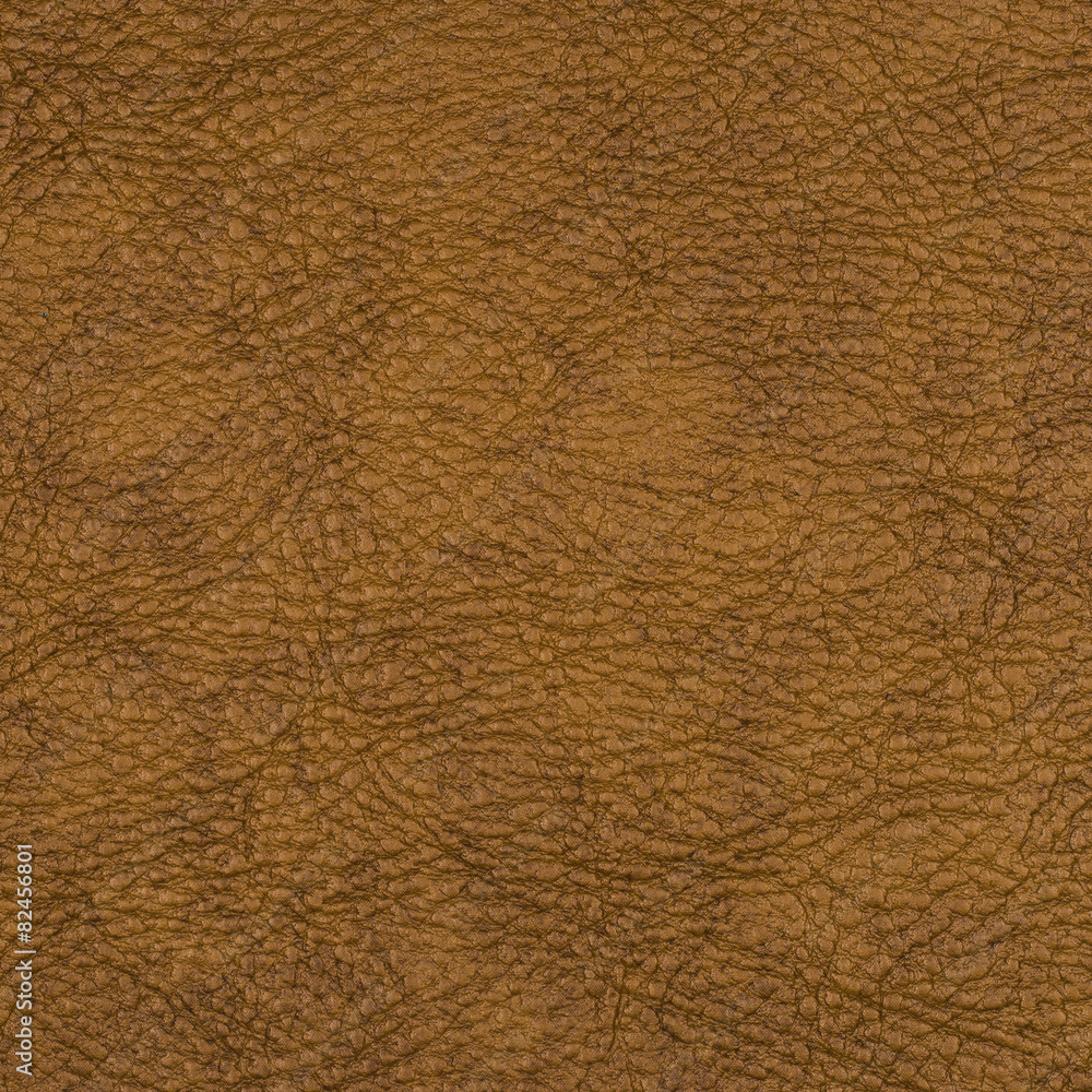 Brown leather texture closeup background. Brown leather texture closeup background.