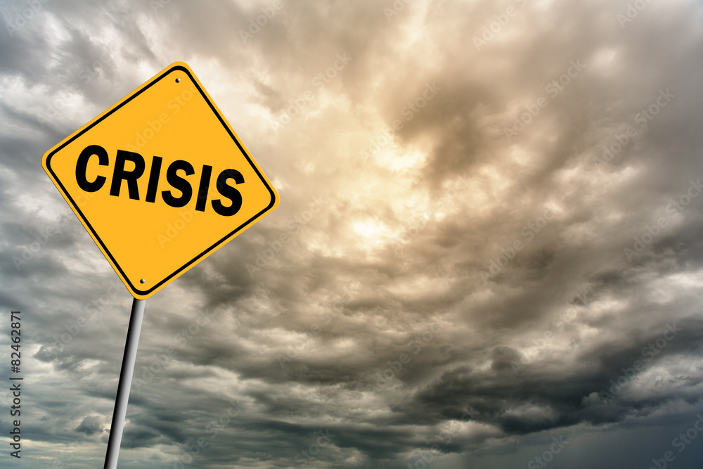 Sign with word 'Crisis' and thunderclouds Sign with word 'Crisis' and thunderclouds