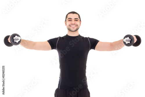 happy man in black sportswear doing exercises with dumbbells iso