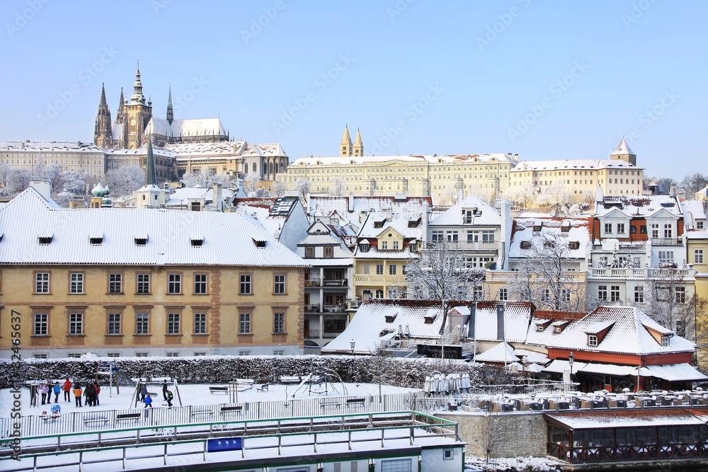 Snowy Prague gothic Castle above River Vltava
