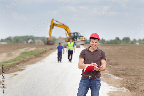Engineer on road construction site