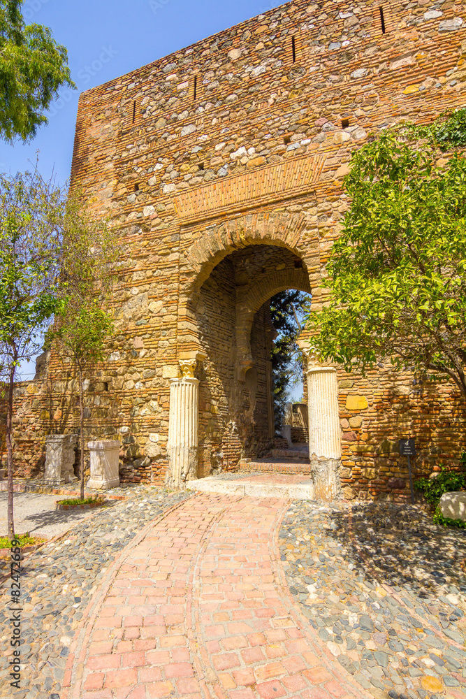 Ancient brick passageway door in the famous La Alcazaba in Malag