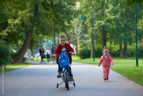 boy and girl with bicycle