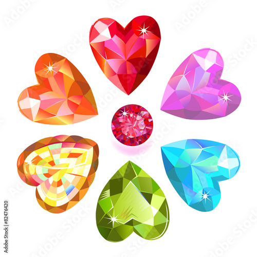 Seamless texture of colored heart cut gems isolated on white bac
