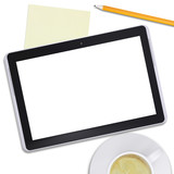 Black tablet and coffee cup with pencil, top view