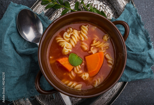 Fresh tomato soup in stoneware bowl