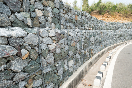 Stone wall - for protect rock fall down and erosion from hill.