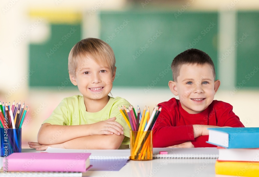 Child. Portrait of two diligent girls looking at camera at Child. Portrait of two diligent girls looking at camera at