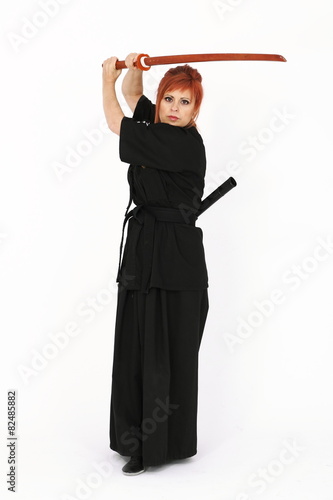 Woman training Haidong Gumdo, a martial art, Kendo form photo